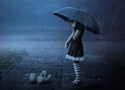 Dziewczynka z misiem i parasolem w deszczu