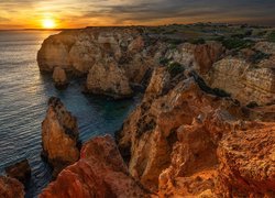Portugalia, Region Algarve, Cypel, Ponta da Piedade, Morze, Skały, Zachód słońca