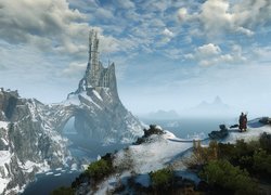 Geralt na wzgórzu spoglądający na zamek