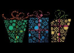 Grafika trzech kolorowych prezentów na czarnym tle