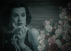 Hedy Lamarr obok róż na drewnie