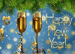 Kieliszki szampana i życzenia noworoczne pod gałązkami