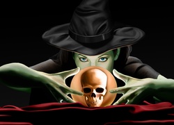 Kobieta-czarownica w kapeluszu z czaszką w kuli
