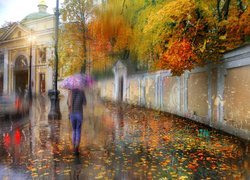 Kobieta podczas deszczu na ulicy