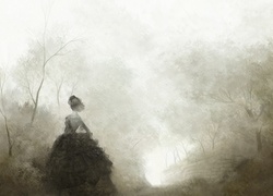 Kobieta spaceruje we mgle