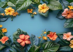 Kolorowe kwiaty i liście na niebieskim tle