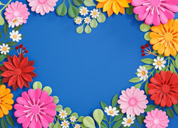 Kolorowe kwiaty na niebieskim tle