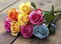 Kolorowe róże na deskach