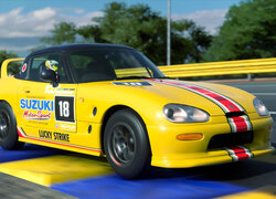 Żółte Suzuki z gry Gran Turismo Sport na torze