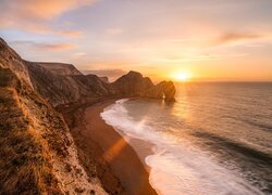 Anglia, Hrabstwo Dorset, Morze, Wybrzeże Jurajskie, Skała, Łuk wapienny, Durdle Door, Wschód słońca