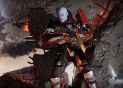 Mężczyzna ukryty za skałą w grze Destiny 2