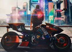 Mężczyzna z gry Cyberpunk 2077 przy motocyklu