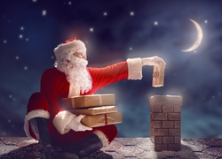 Mikołaj siedząc na dachu w gwieździstą noc wrzuca prezenty do komina