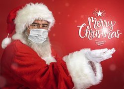 Mikołaj w maseczce obok napisu Merry Christmas