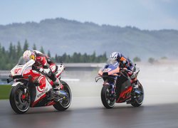 Motocykle Honda i KTM na plakacie do gry MotoGP 21