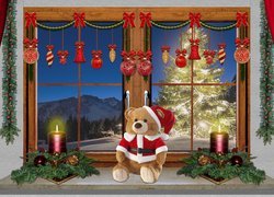Okno ozdobione dekoracją bożonarodzeniową
