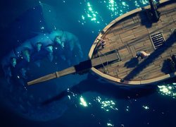 Paszcza rekina obok okrętu w grze Sea of Thieves