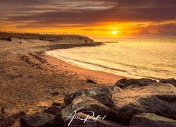 Plaża w Clacton on Sea o wschodzie słońca