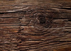 Popękane drewno z sękiem w teksturze