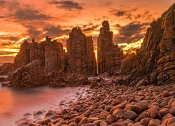 Australia, Wyspa Phillip Island, Przylądek Cape Woolamai, Morze, Zachód słońca, Skały, Kamienie