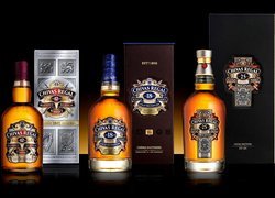 Trzy butelki whisky Chivas Regal