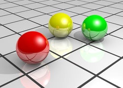 Trzy kolorowe kule w grafice 3D