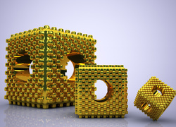Trzy złote obiekty w grafice 3D