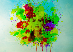 Twarz kobiety na tle rozmazanych farb w grafice paintography