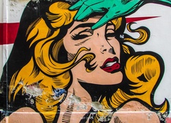 Twarz kobiety z komiksu w graffiti