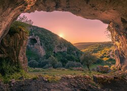 Portugalia, Buracas do Casmilo, Skały, Jaskinia, Zachód słońca