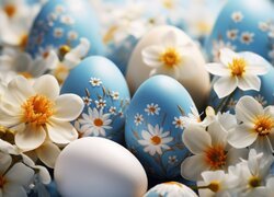 Wielkanocne pisanki wśród białych kwiatków