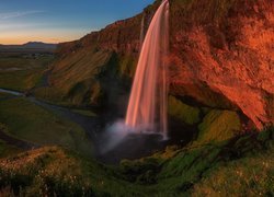 Góry, Skały, Wodospad Seljalandsfoss, Rzeka Seljalandsa, Zachód słońca, Islandia