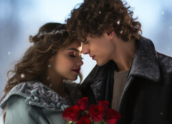 Zakochana para z bukietem czerwonych róż
