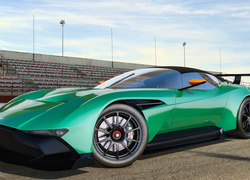 Zielony Aston Martin Vulcan z 2016 roku stoi w pobliżu stadionu