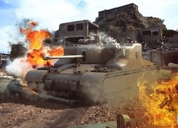 Zniszczony czołg na tle ruin i ognia w grze World of Tanks